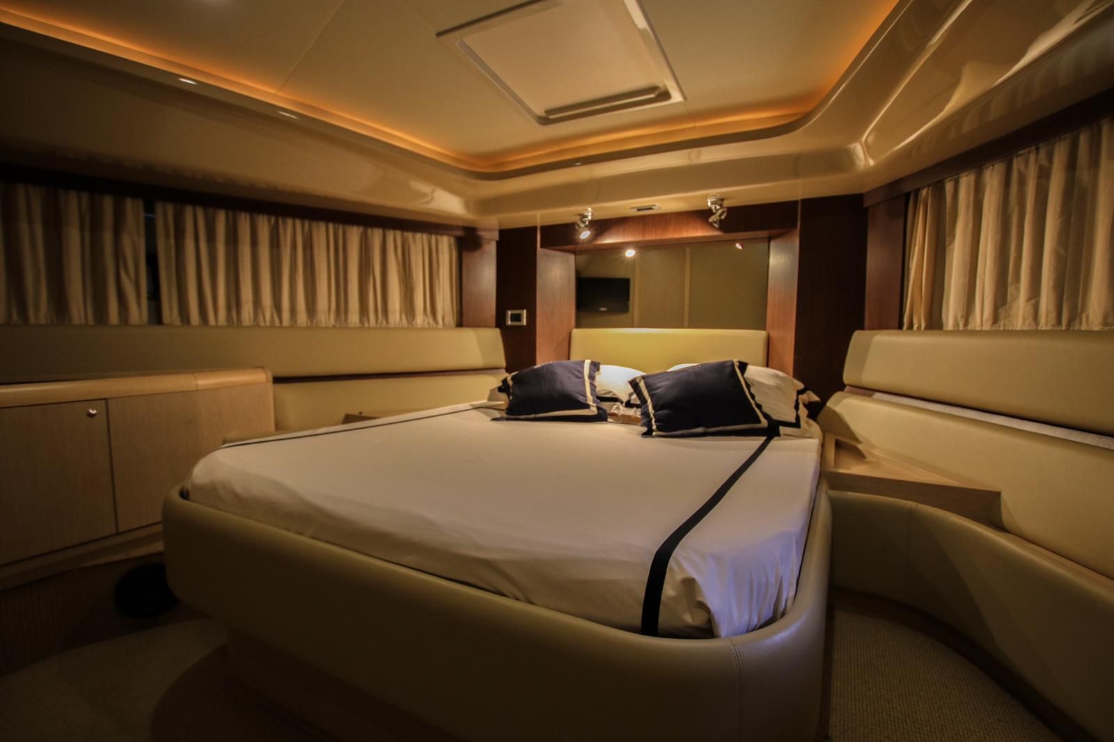 Luxurious master cabin with premium furnishings on Ferretti 591
